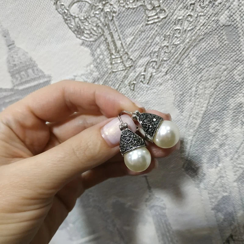 Boucle d'oreille vintage perle