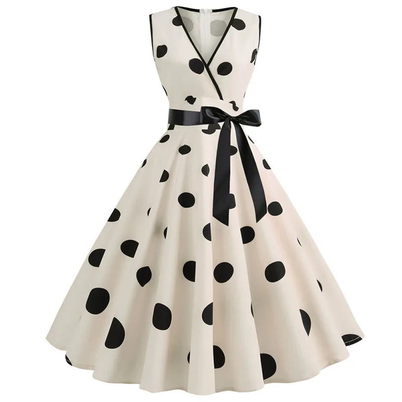 Robe vintage rose à pois noirs