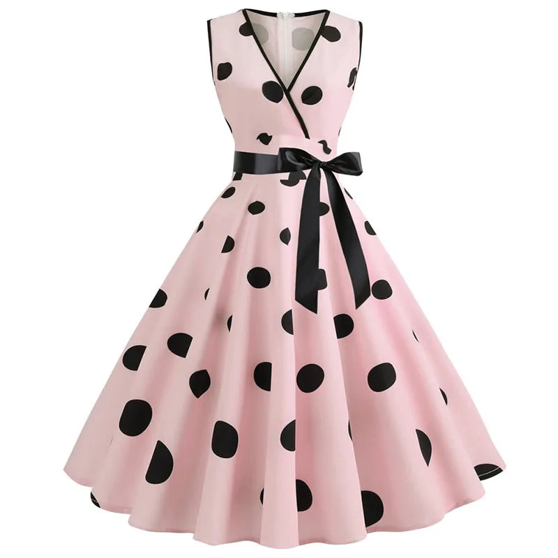 Robe vintage rose à pois noirs