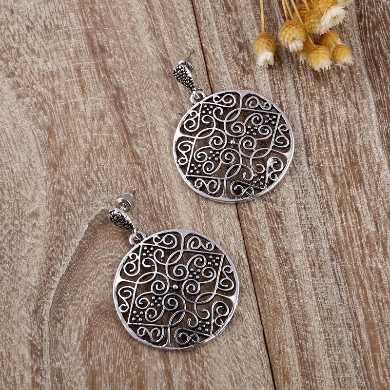 Boucle d'oreille ronde vintage
