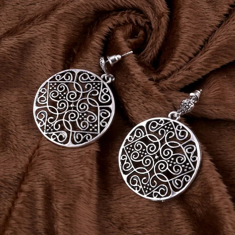 Boucle d'oreille ronde vintage