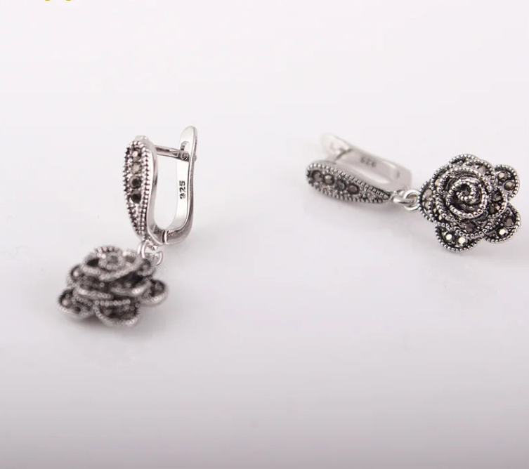 Boucle d'oreille fleur vintage