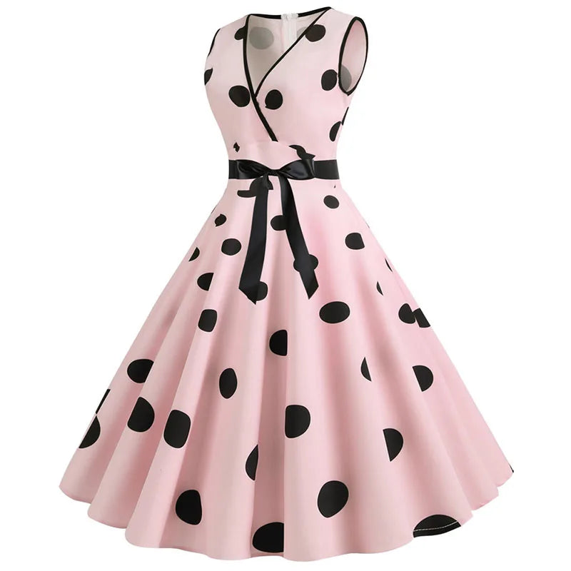Robe vintage rose à pois noirs
