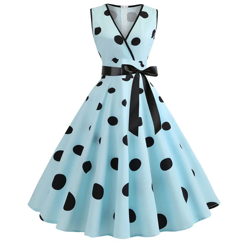 Robe vintage rose à pois noirs