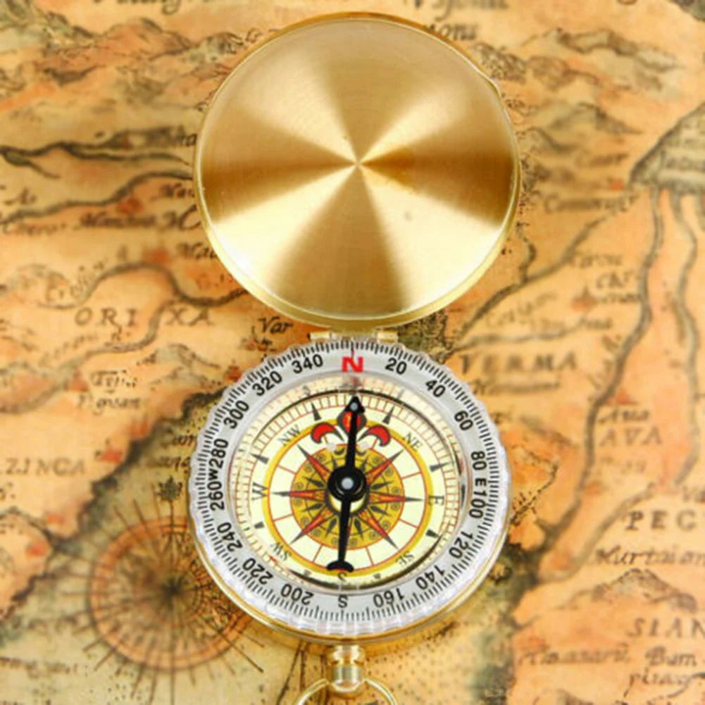 Boussole vintage dorée